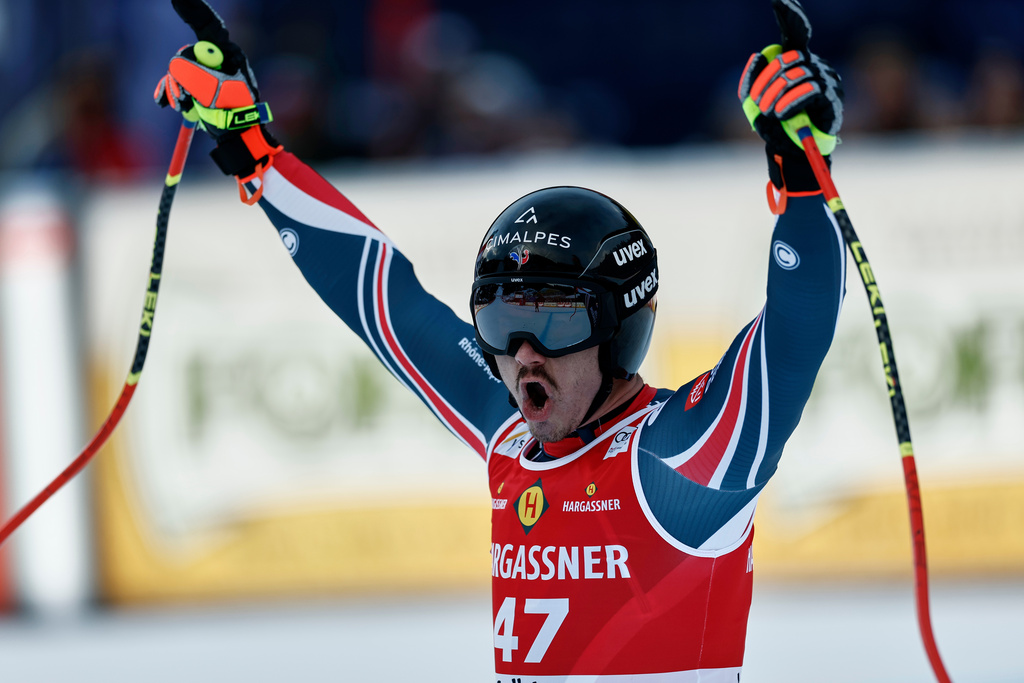 France's Nils Alphand at the finish area of an alpine ski, men's World Cup downhill, in Val Gardena, Italy, Thursday, Dec. 18, 2025. (AP Photo/Gabriele Facciotti)