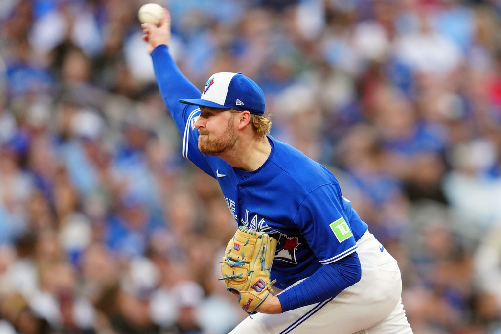 Toronto Blue Jays pitcher Spencer Miles (62) make the pitch against the Miami Marlins during third inning of a baseball game in Toronto on Tuesday May 26, 2026. (Frank Gunn/The Canadian Press via AP)