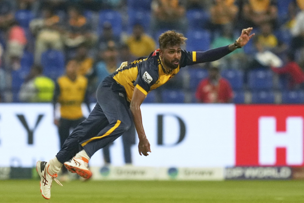 Sri Lanka's Nuwan Thushara bowls a delivery during the Asia Cup cricket match between Afghanistan and Sri Lanka at Zayed Cricket Stadium in Abu Dhabi, United Arab Emirates, Thursday, Sept. 18, 2025. (AP Photo/Altaf Qadri)