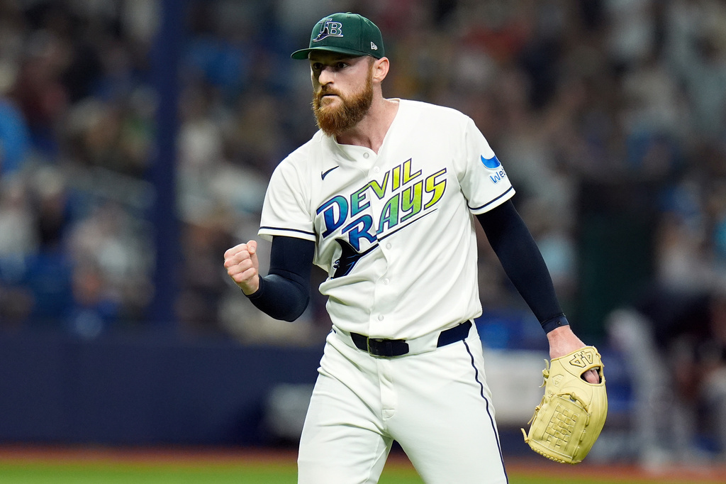 Tampa Bay Rays pitcher Bryan Baker reaacts after closing out the Cleveland Guardians during the ninth inning of a baseball game Saturday, July 25, 2026, in St. Petersburg, Fla. (AP Photo/Chris O'Meara)