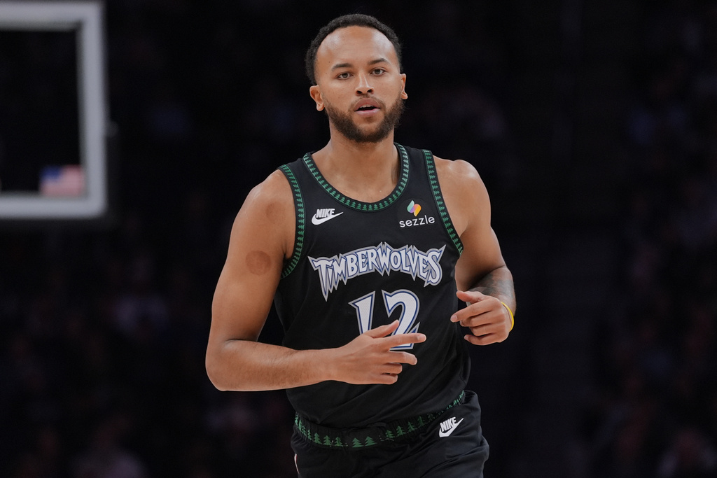 Minnesota Timberwolves forward Kyle Anderson jogs down the court during the first half of an NBA basketball game against the Memphis Grizzlies, Tuesday, March 3, 2026, in Minneapolis. (AP Photo/Abbie Parr)