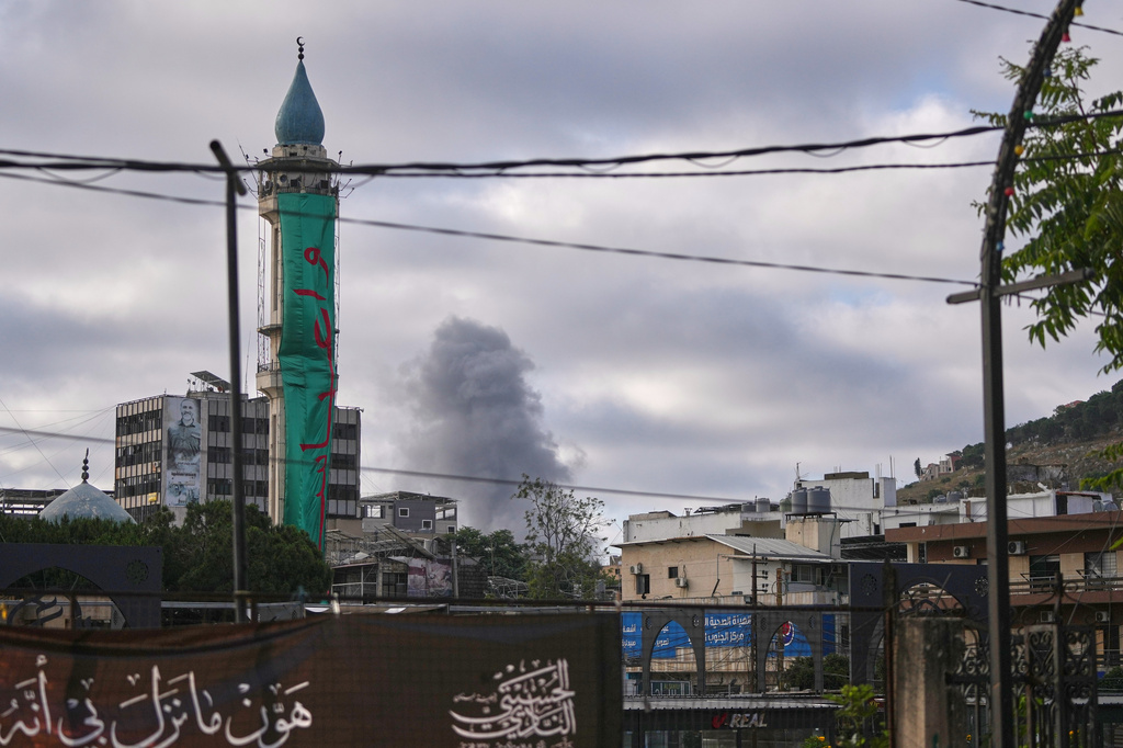 Smoke rises from the site of an Israeli airstrike on the outskirts of Nabatiyeh during Ashoura, when Shiites commemorate the martyrdom of Imam Hussein, the grandson of the Prophet Muhammad, in Nabatiyeh, southern Lebanon, Friday, June 26, 2026. (AP Photo/Hassan Ammar)