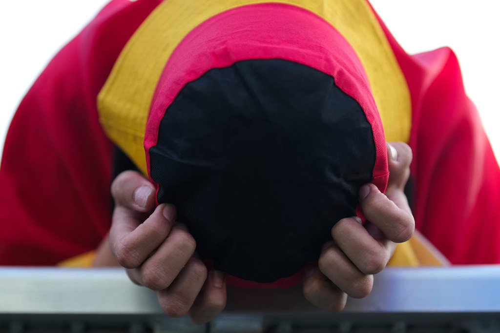 FILE - A German soccer fan reacts at a fan zone after a quarter final match between Germany and Spain at the Euro 2024 soccer tournament in Berlin, Germany, July 5, 2024. (AP Photo/Markus Schreiber, File)