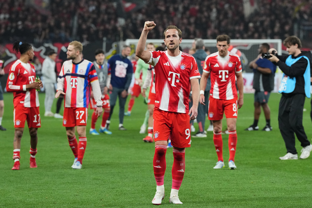 Bayern's Harry Kane celebrates after the German Soccer Cup semifinal match between Bayer Leverkusen and Bayern Munich in Leverkusen, Germany, Wednesday, April 22, 2026. (AP Photo/Martin Meissner)