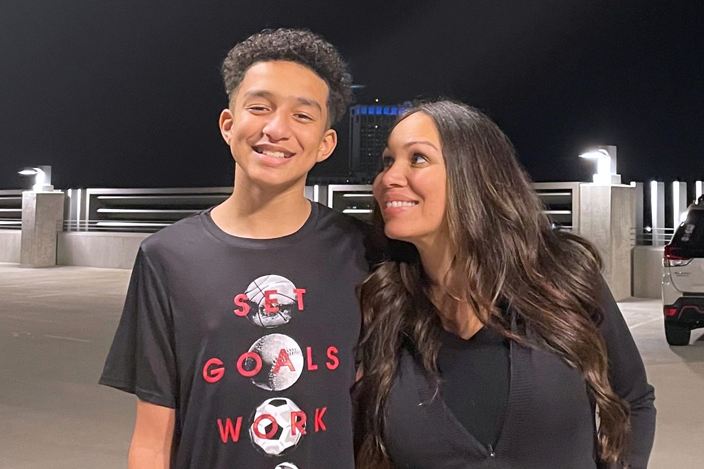 FILE - In this undated photo provided by Megan Garcia of Florida in Oct. 2024, she stands with her son, Sewell Setzer III. (Courtesy Megan Garcia via AP, File)