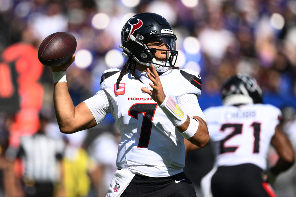 Houston Texans quarterback C.J. Stroud (7) throws during the first half of an NFL football game against the Baltimore Ravens, Sunday, Oct. 5, 2025, in Baltimore. (AP Photo/Nick Wass)