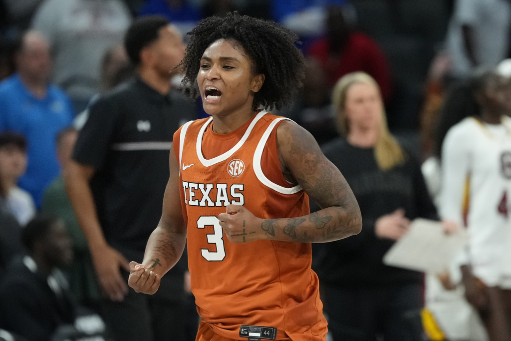 Texas guard Rori Harmon (3) celebrates the team's win over South Carolina in an NCAA college basketball game in the Players Era tournament in Las Vegas, Thursday, Nov. 27, 2025. (AP Photo/Eric Gay)