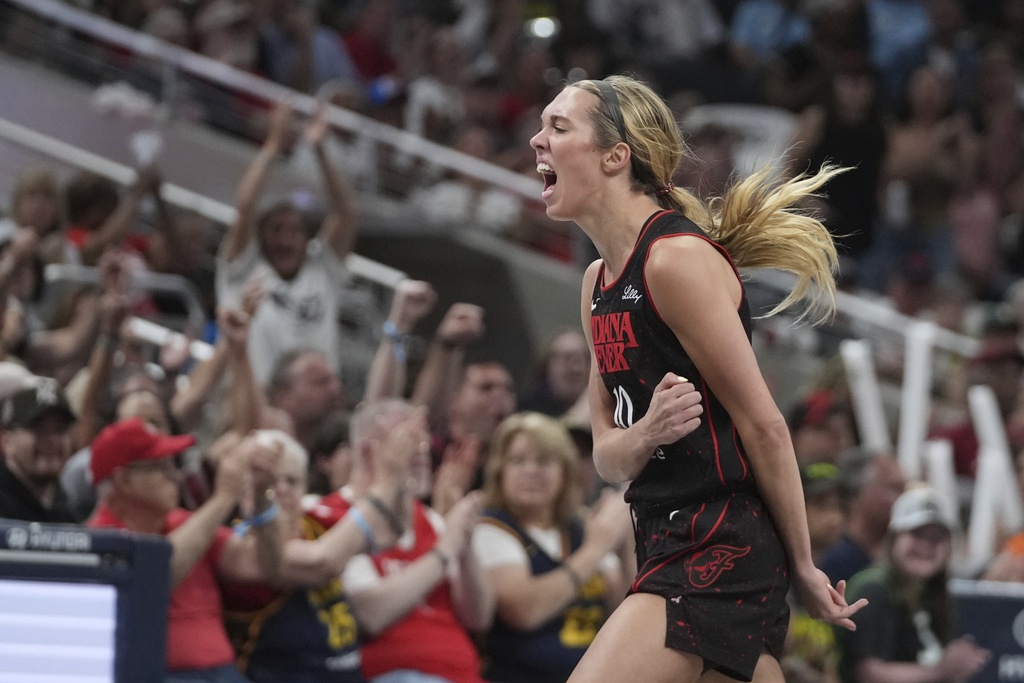 Indiana Fever guard Lexie Hull reacts during the first half of a WNBA basketball game against the Seattle Storm, Tuesday, Aug. 26, 2025, in Indianapolis. (AP Photo/Darron Cummings)