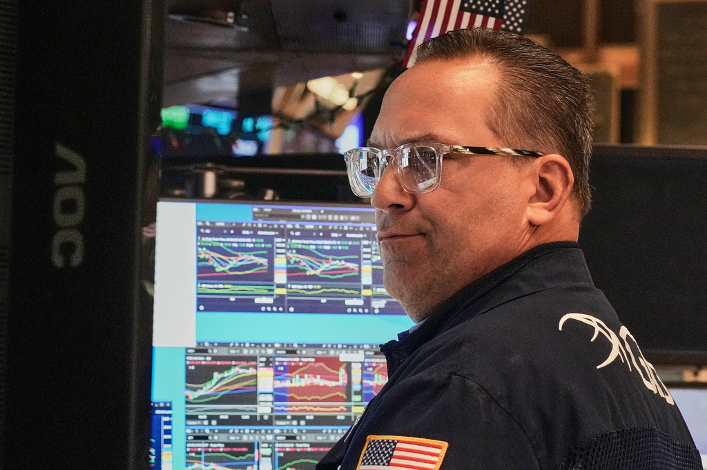 Specialist Anthony Matesic works at his post on the floor of the New York Stock Exchange, Thursday, April 30, 2026. (AP Photo/Richard Drew)