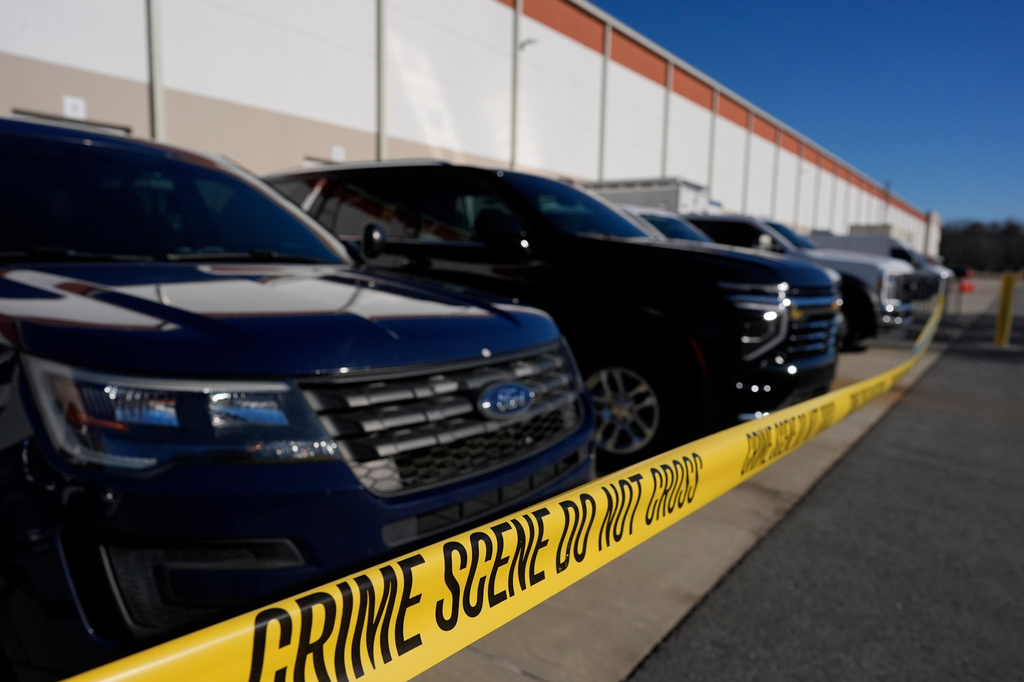 FILE - Crime scene tape is seen as FBI agents search at the Fulton County Election Hub and Operation Center, Jan. 28, 2026, in Union City, Ga., near Atlanta. (AP Photo/Mike Stewart, File)