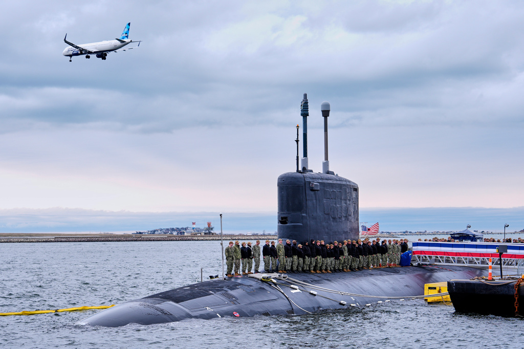 Sailors stand at attention on the USS Massachusetts during a rehearsal ahead of the commissioning of the Navy's newest nuclear-powered attack submarine, Friday, March 27, 2026, in Boston. (AP Photo/Robert F. Bukaty)
