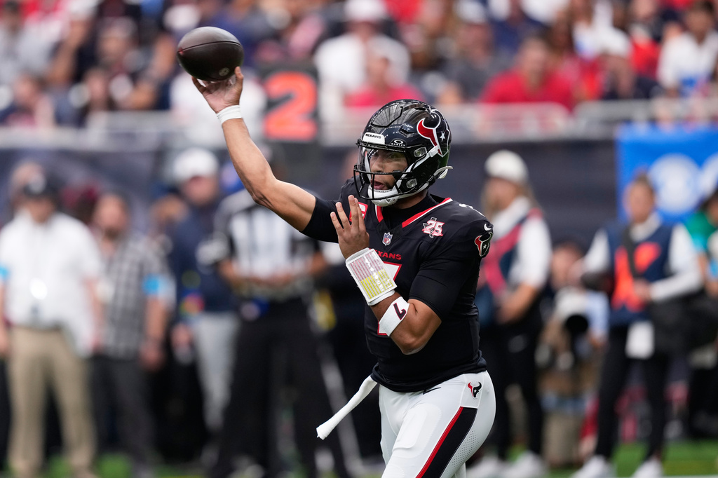 Houston Texans quarterback C.J. Stroud throws a pass during the first half of an NFL football game against the Cincinnati Bengals in Houston, Sunday, Sept. 20, 2026. (AP Photo/David J. Phillip)