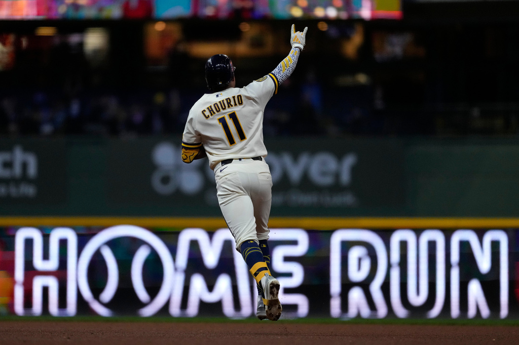 Milwaukee Brewers' Jackson Chourio gestures as he rounds the bases after hitting a two-run home run during the fourth inning of a baseball game against the Cleveland Guardians, Wednesday, June 17, 2026, in Milwaukee. (AP Photo/Aaron Gash)