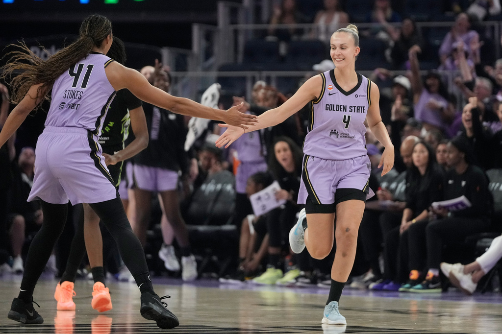 Golden State Valkyries guard Juste Jocyte (4) is congratulated by center Kiah Stokes (41) after scoring during the first half of a WNBA basketball game against the Seattle Storm in San Francisco, Saturday, Sept. 19, 2026. (AP Photo/Jeff Chiu)