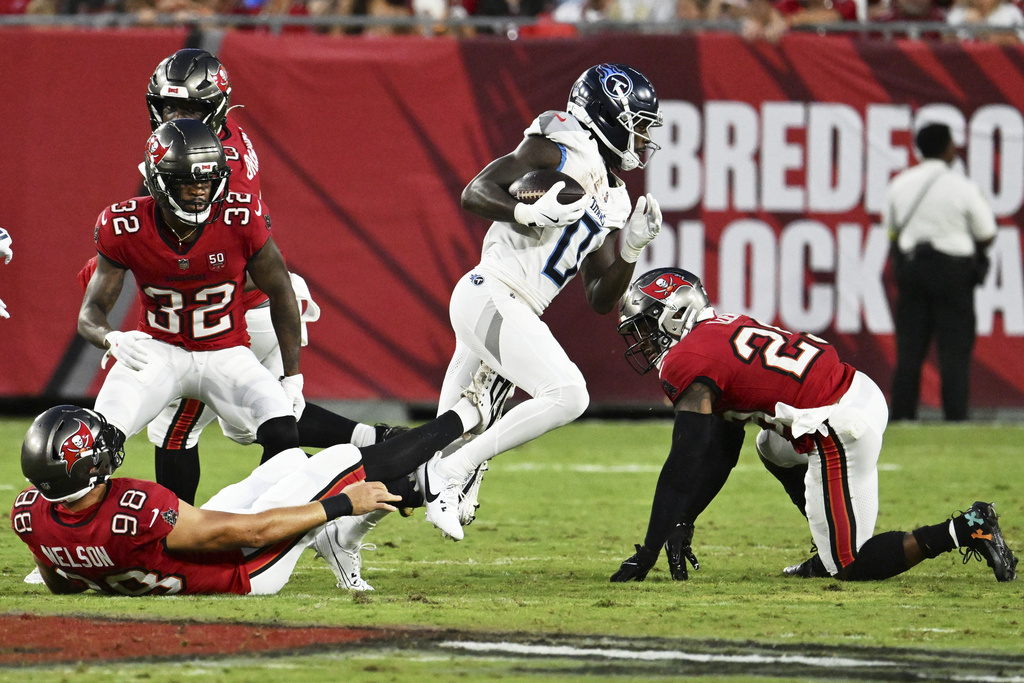 Tennessee Titans wide receiver Calvin Ridley runs against the Tampa Bay Buccaneers during the first half of an NFL preseason football game on Saturday, Aug. 9, 2025, in Tampa, Fla. (AP Photo/Jason Behnken)