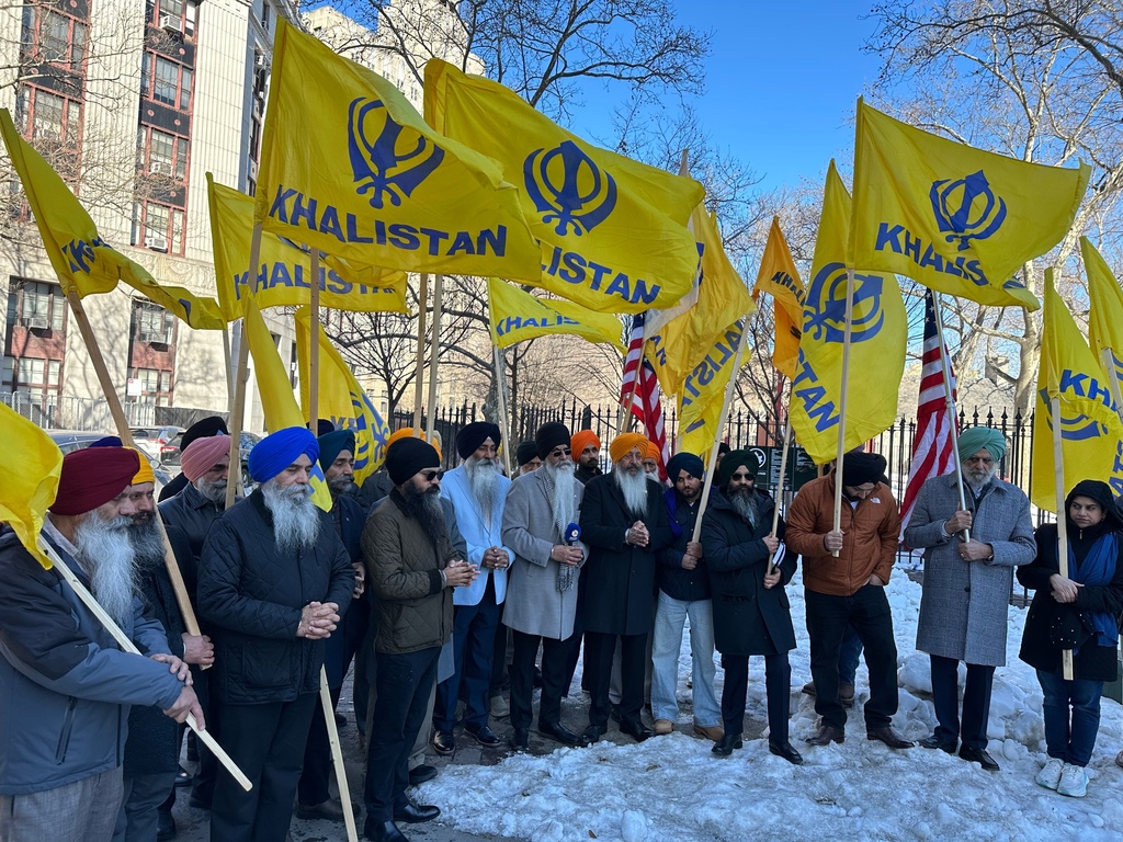 Sikhs from across the United States and Canada pray outside Manhattan federal court in New York, Friday, Feb. 13, 2026, after a man from India pleads guilty to conspiring to assassinate a New York lawyer and human rights advocate campaigning to turn Punjab, a state in northwest India, into a sovereign Sikh state to be renamed the Democratic Republic of Khalistan. (AP Photo/Larry Neumeister)