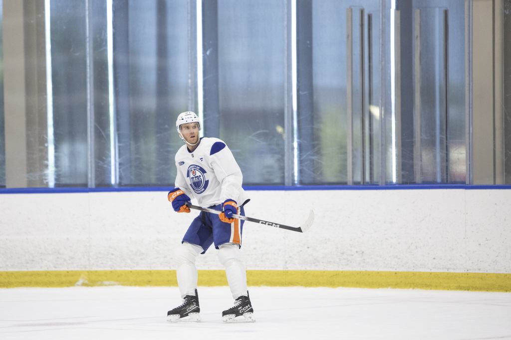 Edmonton Oilers' Connor McDavid (97) skates during NHL hockey training camp in Edmonton, Alberta, Thursday, Sept. 18, 2025. (Amber Bracken/The Canadian Press via AP)