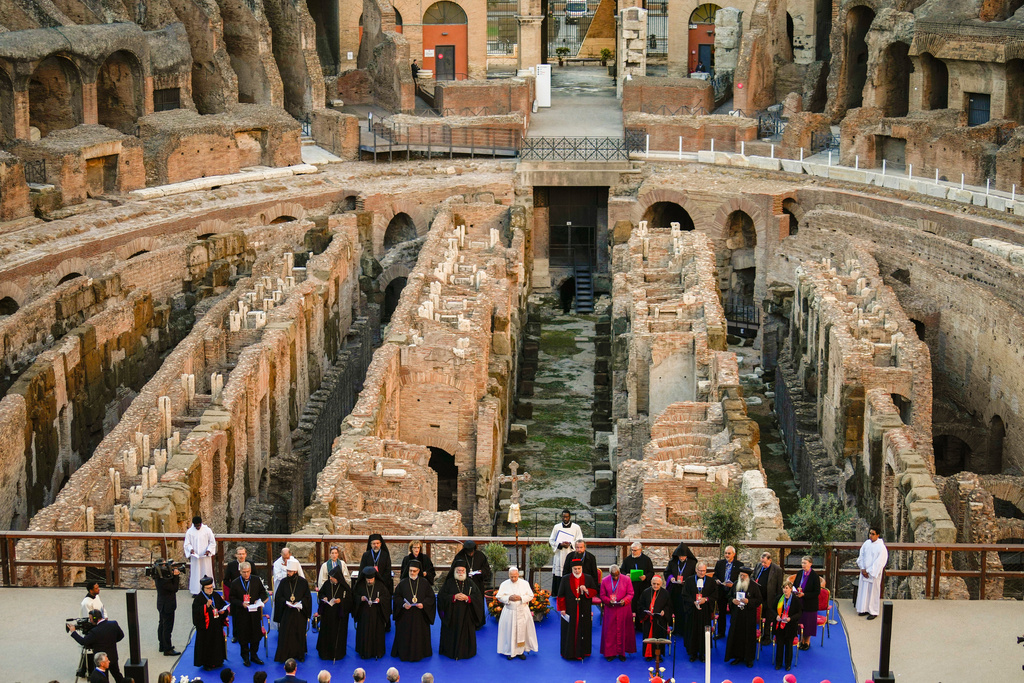 FILE - Pope Leo XIV attends an inter-religious meeting to pray for peace inside the Colosseum in Rome, Oct. 28, 2025. (AP Photo/Gregorio Borgia, File)