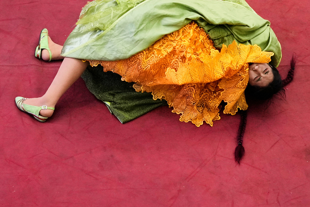 Fernanda Romero wrestles during a ticketed wrestling show in El Alto, Bolivia, Saturday, May 3, 2025. (AP Photo/Juan Karita)