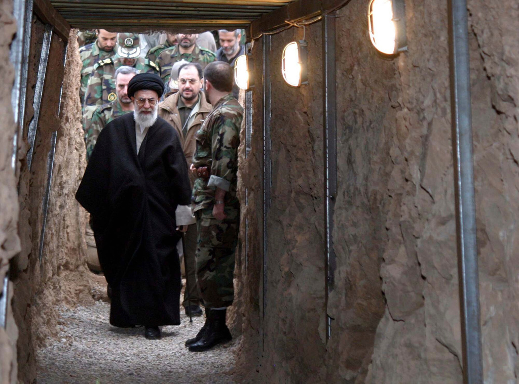 FILE - Iran's Supreme Leader Ayatollah Khamenei visits military manoeuvres by the army, in the southwestern province of Khouzestan, Iran, near the border with Iraq, Dec. 8, 2004. (AP Photo, File)