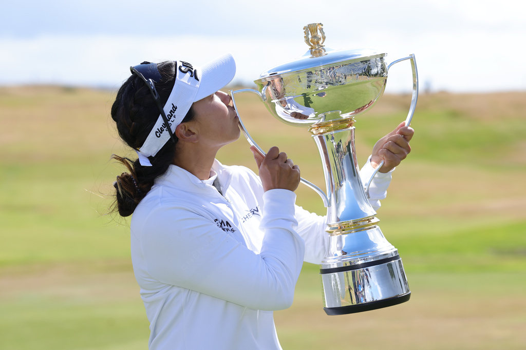 Jenny Shin of South Korea celebrates winning the 2026 ISPS HANDA Women's Scottish Open at Dundonald Links, Ayrshire, Sunday July 26, 2026. (Steve Welsh/PA via AP)