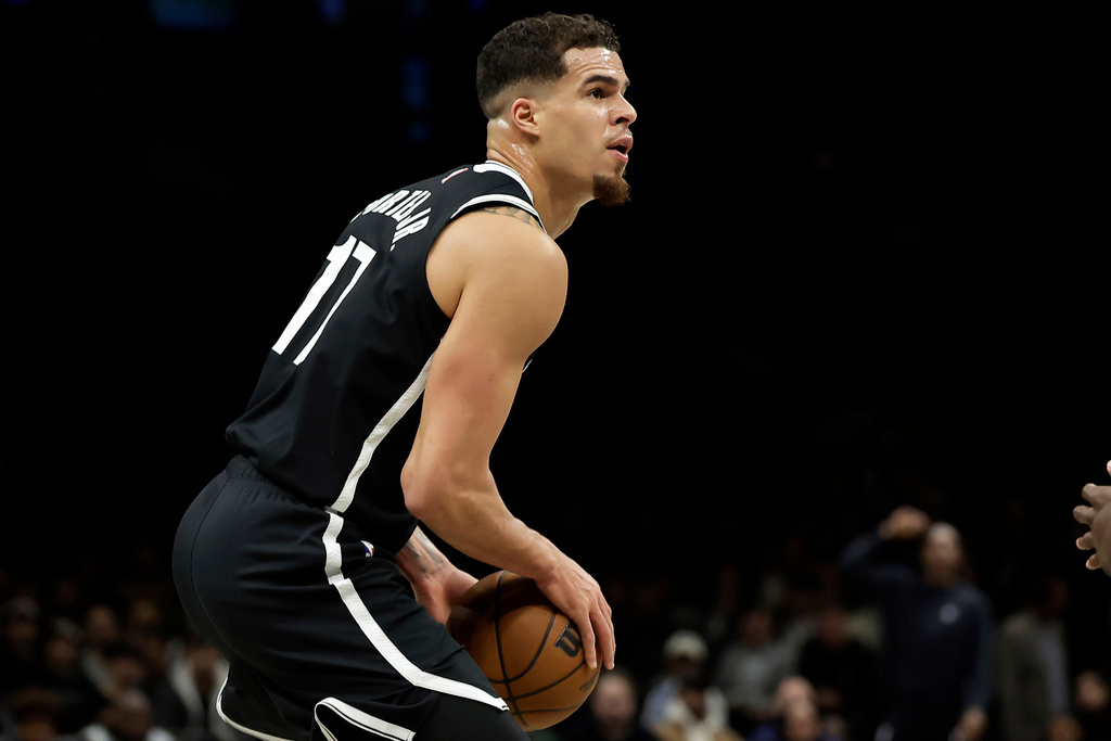 Brooklyn Nets forward Michael Porter Jr. looks to shoot during the first half of an NBA basketball game against the Charlotte Hornets, Monday, Dec. 1, 2025, in New York. (AP Photo/Adam Hunger)