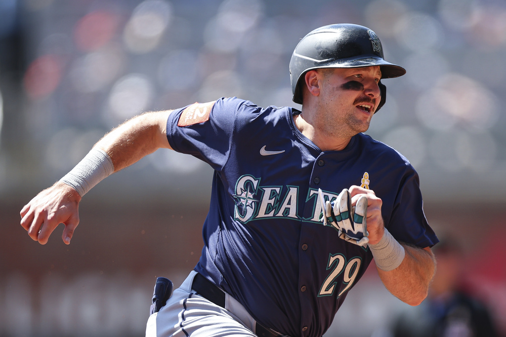 Seattle Mariners' Cal Raleigh rounds third base before scoring in the third inning of a baseball game against the Atlanta Braves, Sunday, Sept. 7, 2025, in Atlanta. (AP Photo/Colin Hubbard)