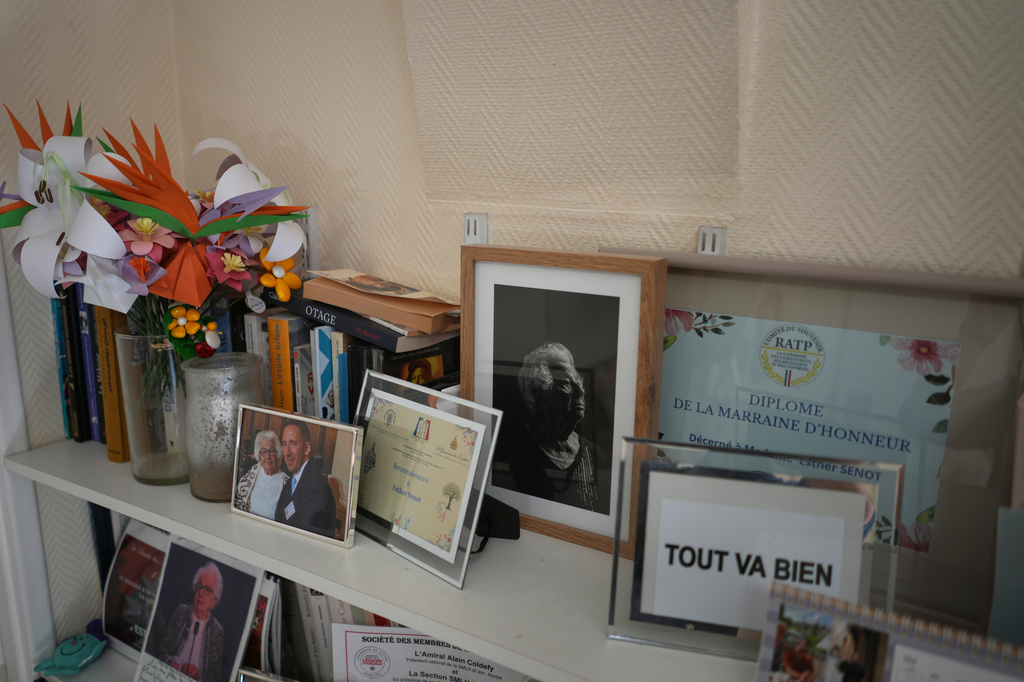 Books and photos in the room of Auschwitz concentration camp survivor Esther Senot at the National Institution of Invalides in Paris, on May 6, 2026.(AP Photo/Thibault Camus)