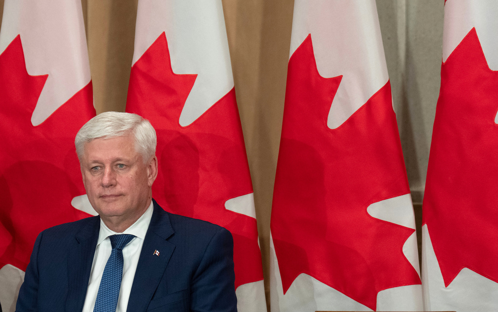 Canada's former Prime Minister Stephen Harper listens to a speaker during a ceremony for his official portrait unveiling in Ottawa, Ontario, Tuesday, Feb. 3, 2026. (Adrian Wyld/The Canadian Press via AP)