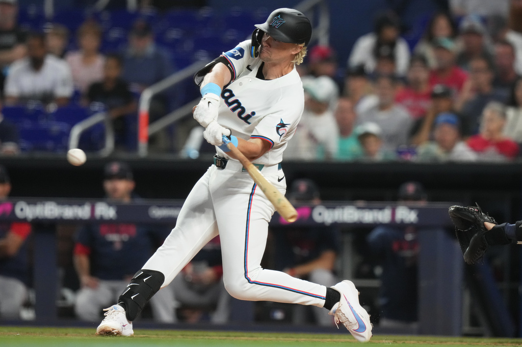 Miami Marlins' Kyle Stowers hits a single during the of a baseball game against the Boston Red Sox, Wednesday, Aug. 26, 2026, in Miami. (AP Photo/Lynne Sladky)