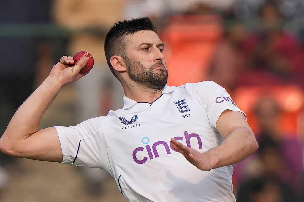 FILE - England's Mark Wood bowls a delivery during the second day of the first cricket test match between England and India in Hyderabad, India, Friday, Jan. 26, 2024. (AP Photo/Mahesh Kumar A., File)