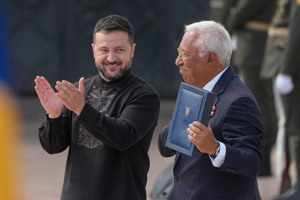 Ukraine's President Volodymyr Zelenskyy, left, hands over the Ukraine state award to European Council President Antonio Costa during a commemorative ceremony in Kyiv, Ukraine, Monday, Aug. 24, 2026, marking Ukraine's 35th Independence Day. (AP Photo/Efrem Lukatsky)