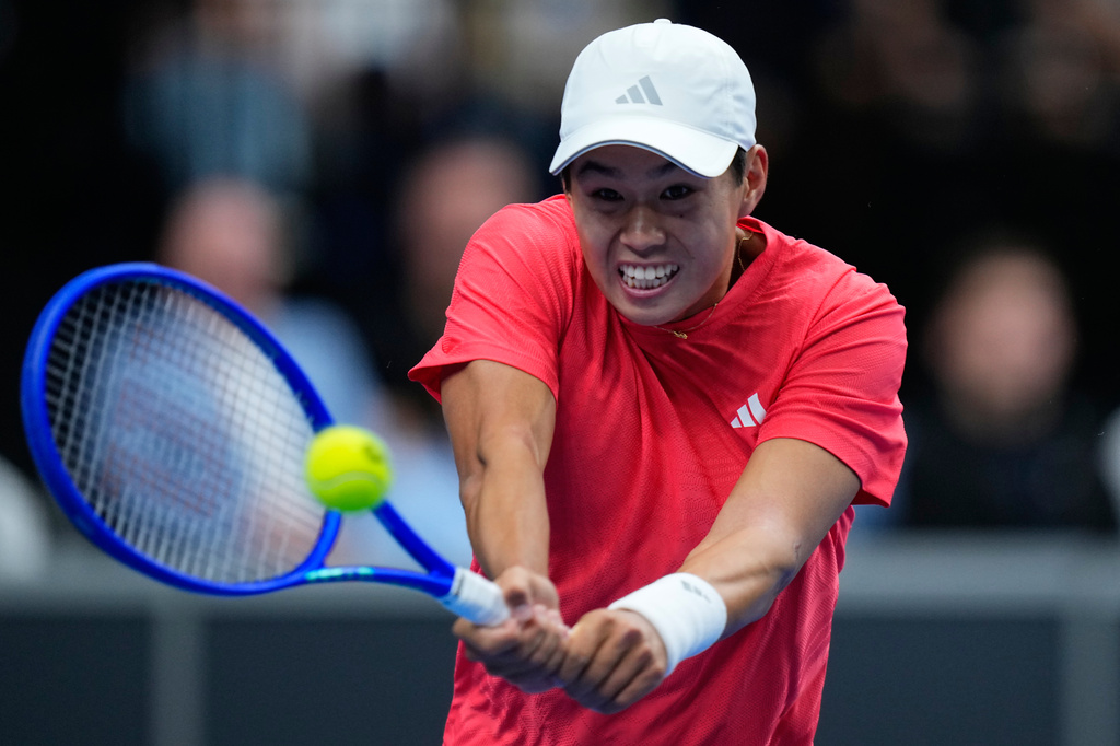 United States' Learner Tien returns the ball Czechia's Jakub Mensik during the Davis Cup second round qualifier match between the Czech Republic and the United States, in Prague, Friday, Sept. 18, 2026. (AP Photo/Petr David Josek)