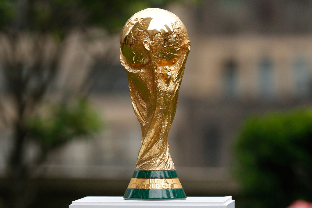 FILE - The FIFA World Cup Trophy is displayed before press conference at Rockefeller Plaza, June 16, 2022, in New York. (AP Photo/Noah K. Murray, File)
