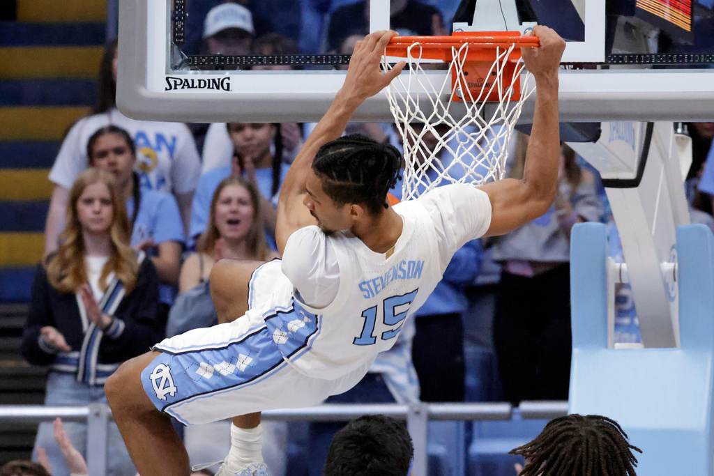 North Carolina forward Jarin Stevenson (15) follows through on a dunk against Pittsburgh during the second half of an NCAA college basketball game, Saturday, Feb. 14, 2026, in Chapel Hill, N.C. (AP Photo/Chris Seward)