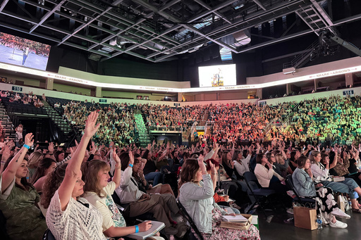 People attend the "Share the Arrows" women's conference, Saturday, Oct. 11, 2025, at the Credit Union of Texas Event Center in Allen, Texas. (Kathryn Post/RNS via AP) People attend the "Share the Arrows" women's conference, Saturday, Oct. 11, 2025, at the Credit Union of Texas Event Center in Allen, Texas. (Kathryn Post/RNS via AP)