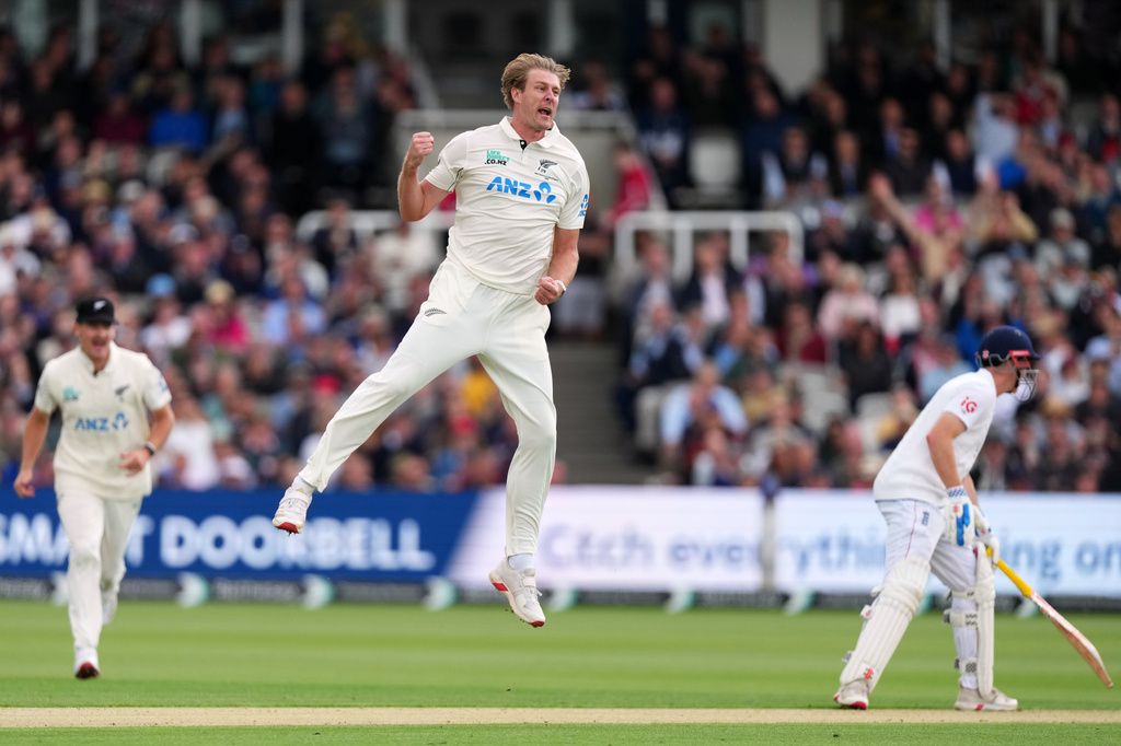 New Zealand's Kyle Jamieson celebrates taking the wicket of England's Jamie Smith during the first day of the test match between England and New Zealand at Lord's cricket ground in London, Thursday, June 4, 2026. (AP Photo/Kirsty Wigglesworth)
