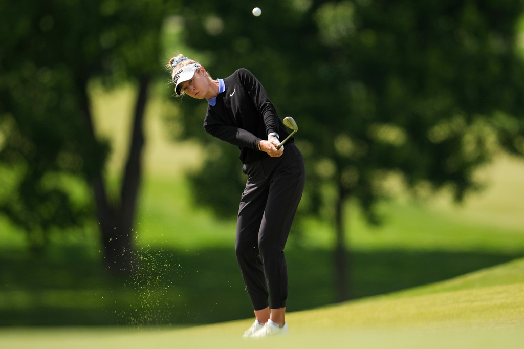 Nelly Korda plays a shot on the 13th hole during the first round of the Queen City Championship LPGA golf tournament at Maketewah Country Club, Thursday, May 14, 2026, in Cincinnati. (AP Photo/Jeff Dean)