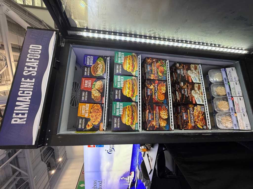 A variety of packaged seafood meals appear at the Seafood Expo North America in Boston on March 17, 2026. (J. M. Hirsch via AP)