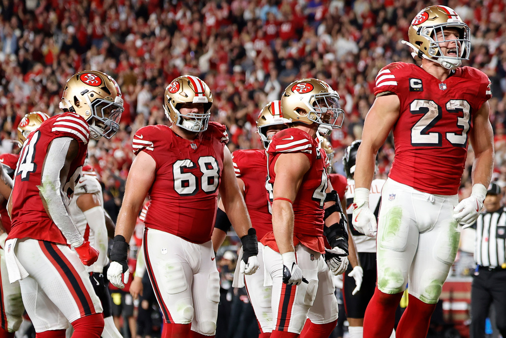 San Francisco 49ers running back Christian McCaffrey (23) celebrates his touchdown against the Atlanta Falcons in the second half of an NFL football game, Sunday, Oct. 19, 2025, in Santa Clara, Calif. (AP Photo/Kelley L Cox)