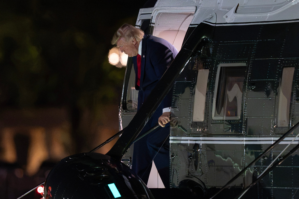 President Donald Trump steps off from Marine One upon his arrival at the Ellipse just outside of the White House, Wednesday, Aug. 5, 2026, in Washington. (AP Photo/Jose Luis Magana)