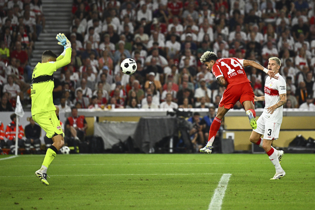 Bayern's Luis Díaz, center, celebrates scores past Stuttgart's goalkeeper Fabian Bredlow the German Supercup final soccer match between VfB Stuttgart and Bayern Munich in Stuttgart, Germany, Saturday, Aug. 16, 2025. (Tom Weller/dpa via AP)