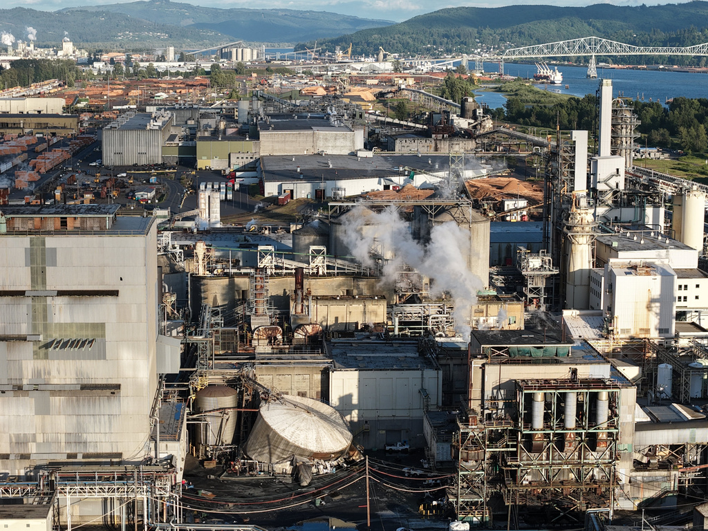 FILE - Damage is seen at Nippon Dynawave Packaging Co., after a tank containing hazardous liquid imploded, on Tuesday, May 26, 2026, in Longview, Wash. (Karen Ducey/The Seattle Times via AP, File)