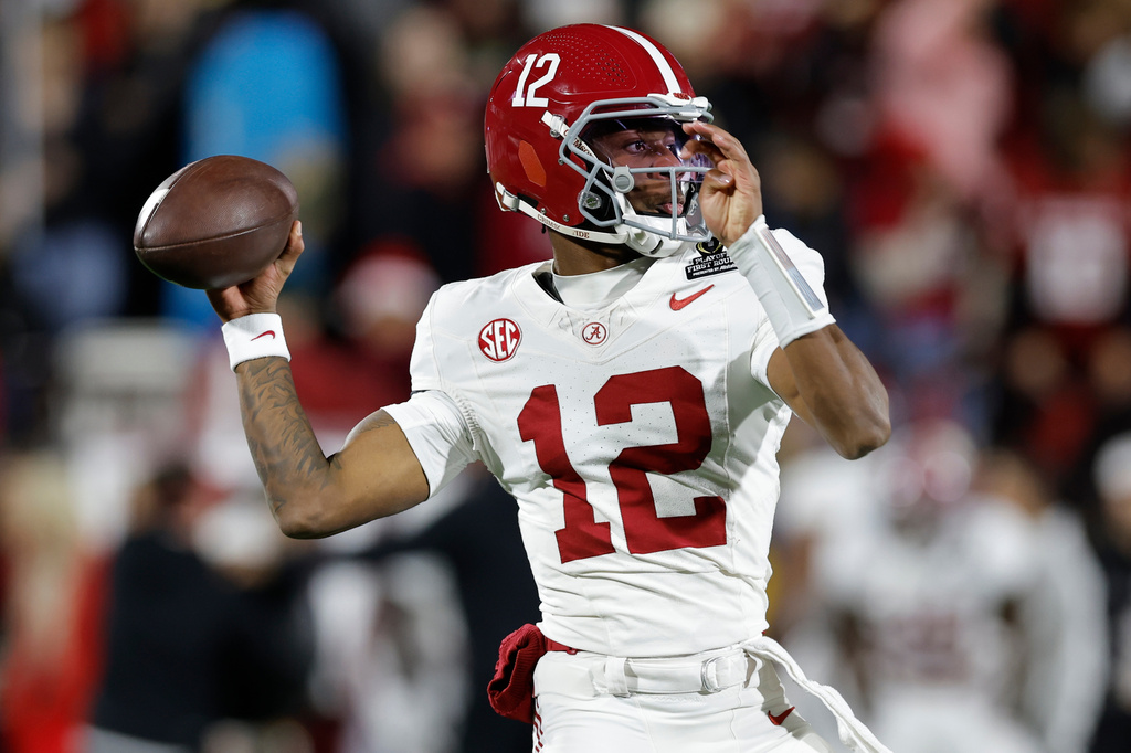 FILE - Alabama quarterback Keelon Russell (12) warms up before the first round of an NCAA College Football Playoff against Oklahoma, Friday, Dec. 19, 2025, in Norman, Okla. (AP Photo/Alonzo Adams, File)