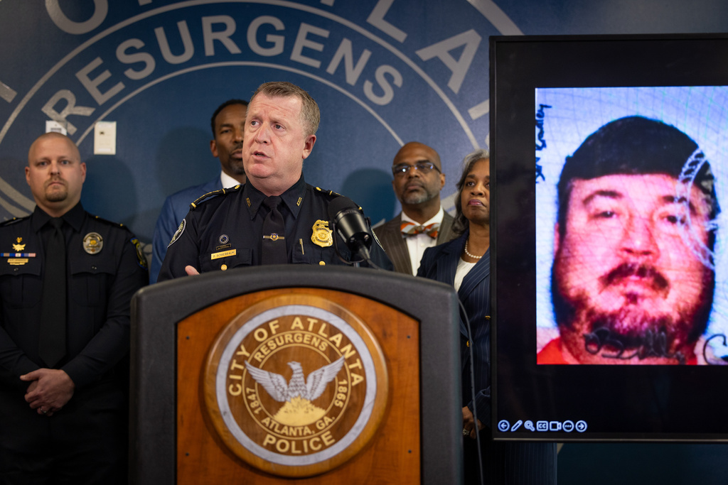 Atlanta Police Chief Darin Schierbaum speaks during a press conference at the Atlanta Police Department headquarters in Atlanta on Monday, October 20, 2025, regarding a Cartersville man, Billy Cagle, who threatened to "shoot up" the airport. (Arvin Temkar/Atlanta Journal-Constitution via AP)