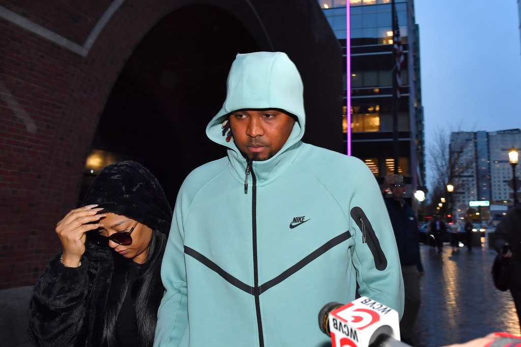 Cleveland Guardians baseball pitcher Luis Ortiz, center, departs Federal Court following a hearing, Monday, Nov. 10, 2025, in Boston. (AP Photo/Steven Senne)