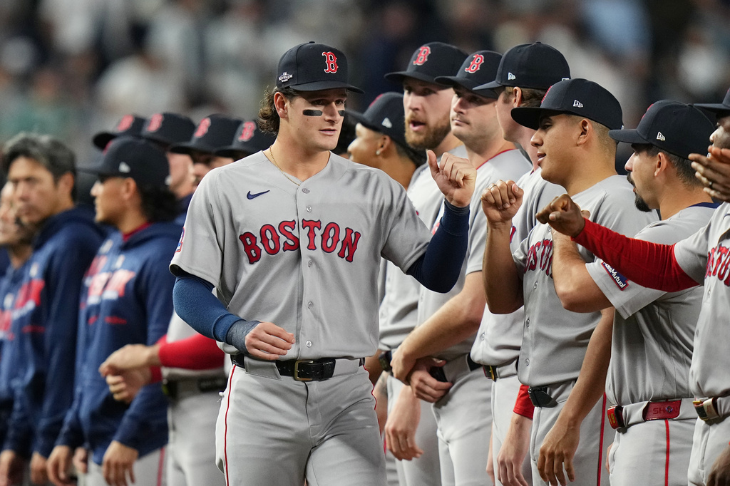 Boston Red Sox designated hitter Roman Anthony greets teammates prior to Game 1 of baseball's American League Wild Card Series against the New York Yankees, Tuesday, Sept. 29, 2026, in New York. (AP Photo/Frank Franklin II)