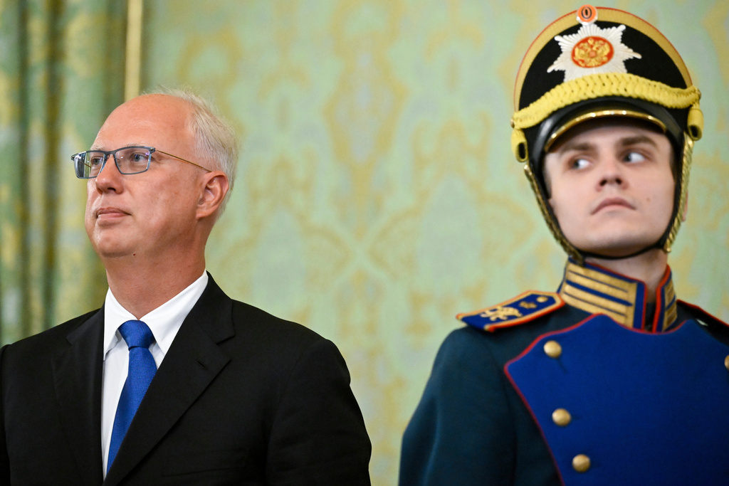 FILE - Russian Direct Investment Fund CEO Kirill Dmitriev, left, attends a meeting between Russian President Vladimir Putin and United Arab Emirates leader Sheikh Mohammed bin Zayed Al Nahyan at the Grand Kremlin Palace in Moscow, on Aug. 7, 2025. (Alexander Nemenov/Pool Photo via AP, File)