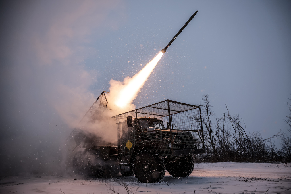 In this photo provided by Ukraine's 24th Mechanized Brigade press service, declared to be taken on Jan. 24, 2026, an MRLS BM-21 "Grad" fires towards Russian army positions near Chasiv Yar, Donetsk region, Ukraine. (Oleg Petrasiuk/Ukraine's 24th Mechanized Brigade via AP)