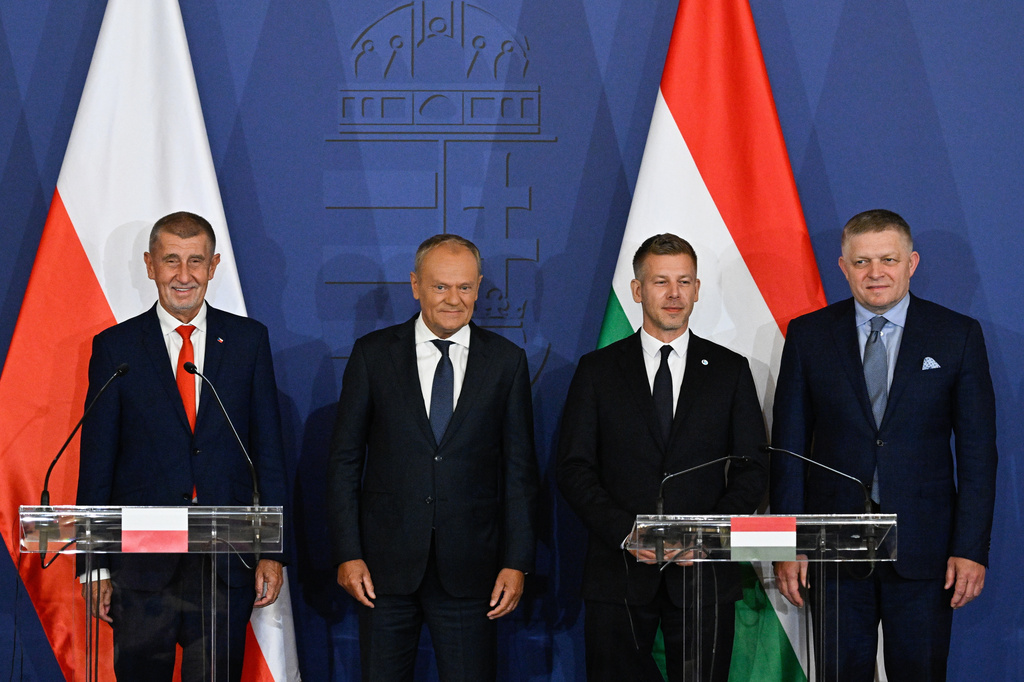 From left, Czech Republic's Premier Andrej Babis, Poland's Premier Donald Tusk, Hungary's Premier Peter Magyar and Slovakia's Premier Robert Fico arrive for a press conference to conclude the one-day the summit of the Visegrad Group (V4) countries in the Royal Castle in Godollo, northern Hungary, Tuesday, June 23, 2026. (Robert Hegedus/MTI via AP)